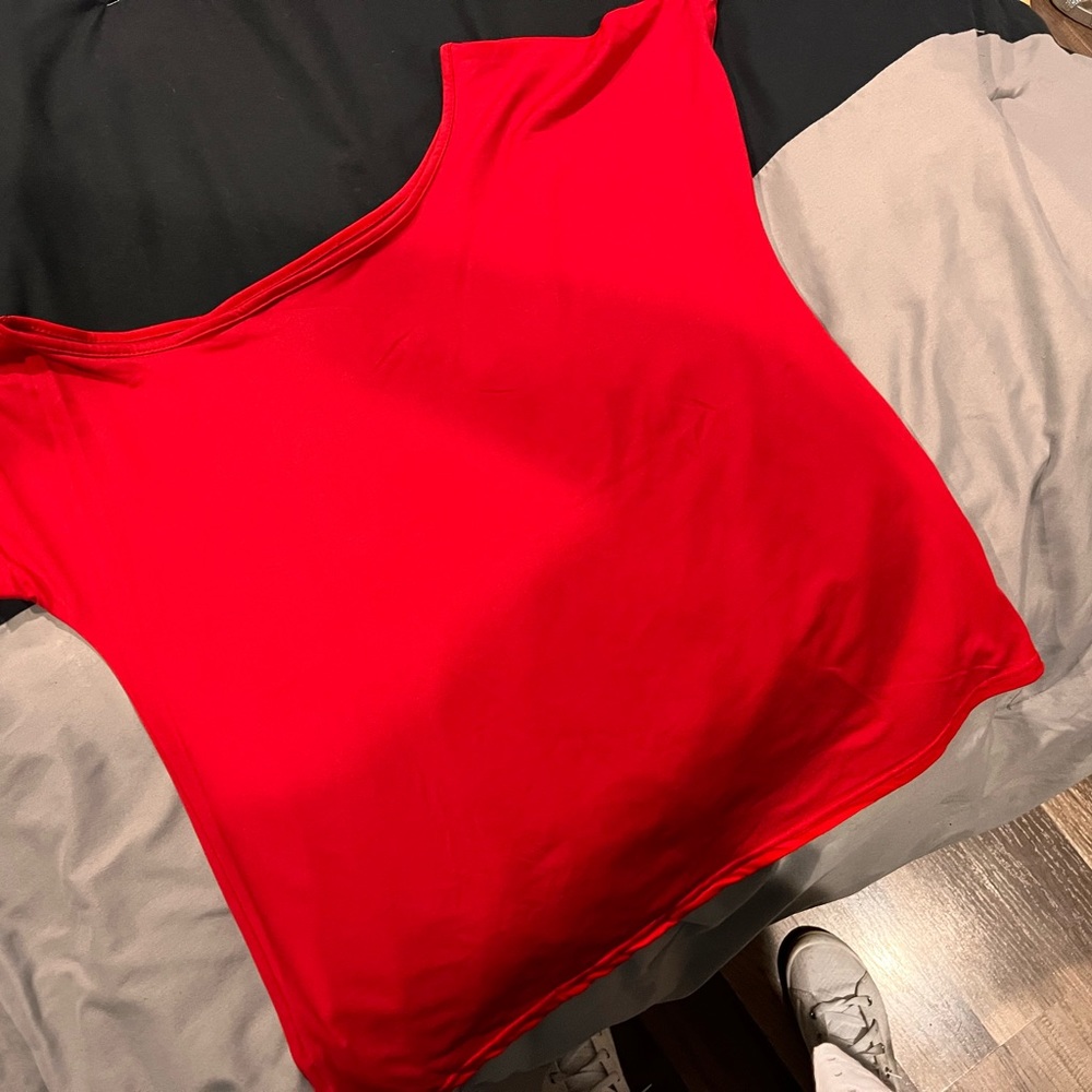 Brand new off shoulder shirt .